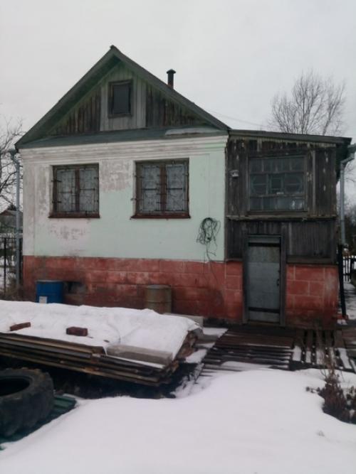 Добрый день.  Подскажите, пожалуйста, как и чем с минимум затрат можно обшить дачный дом? 01