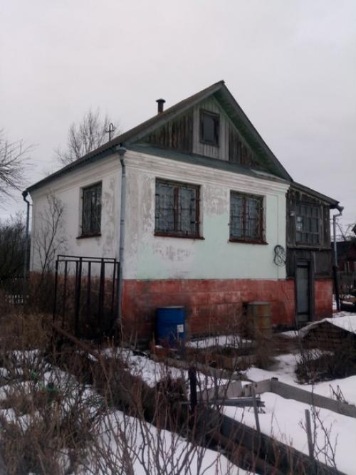 Добрый день.  Подскажите, пожалуйста, как и чем с минимум затрат можно обшить дачный дом? 04