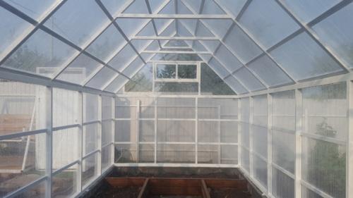 Осуществил давнюю мечту жены об основательной теплице. 06