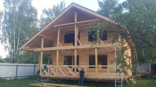 Коттедж площадью 168 м кв, размер дома 10 х 8 в два этажа с просторной террасой и балконом. 09