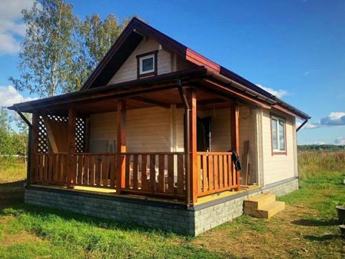 Проект летнего дома с мансардой Дачник.