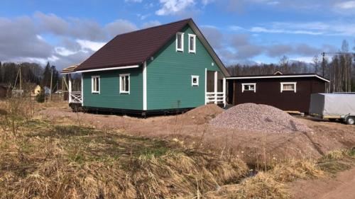 Каркасный дом 10, 5 х 7, 5 м. с террасой и крыльцом. 04