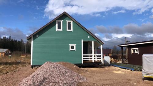 Каркасный дом 10, 5 х 7, 5 м. с террасой и крыльцом. 03