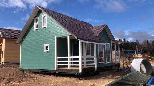 Каркасный дом 10, 5 х 7, 5 м. с террасой и крыльцом. 02